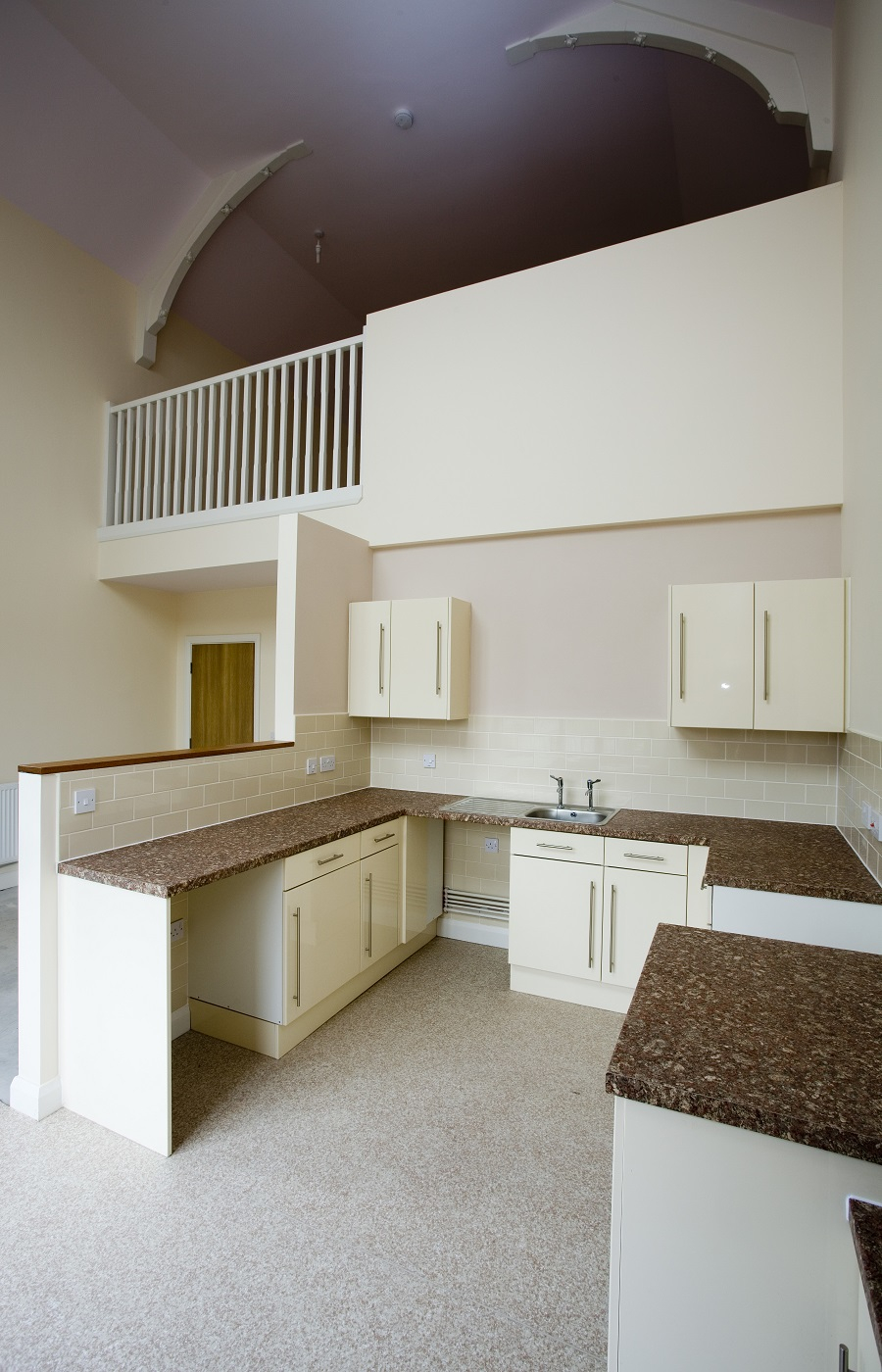 A light brown and tan kitchen marble worktops.